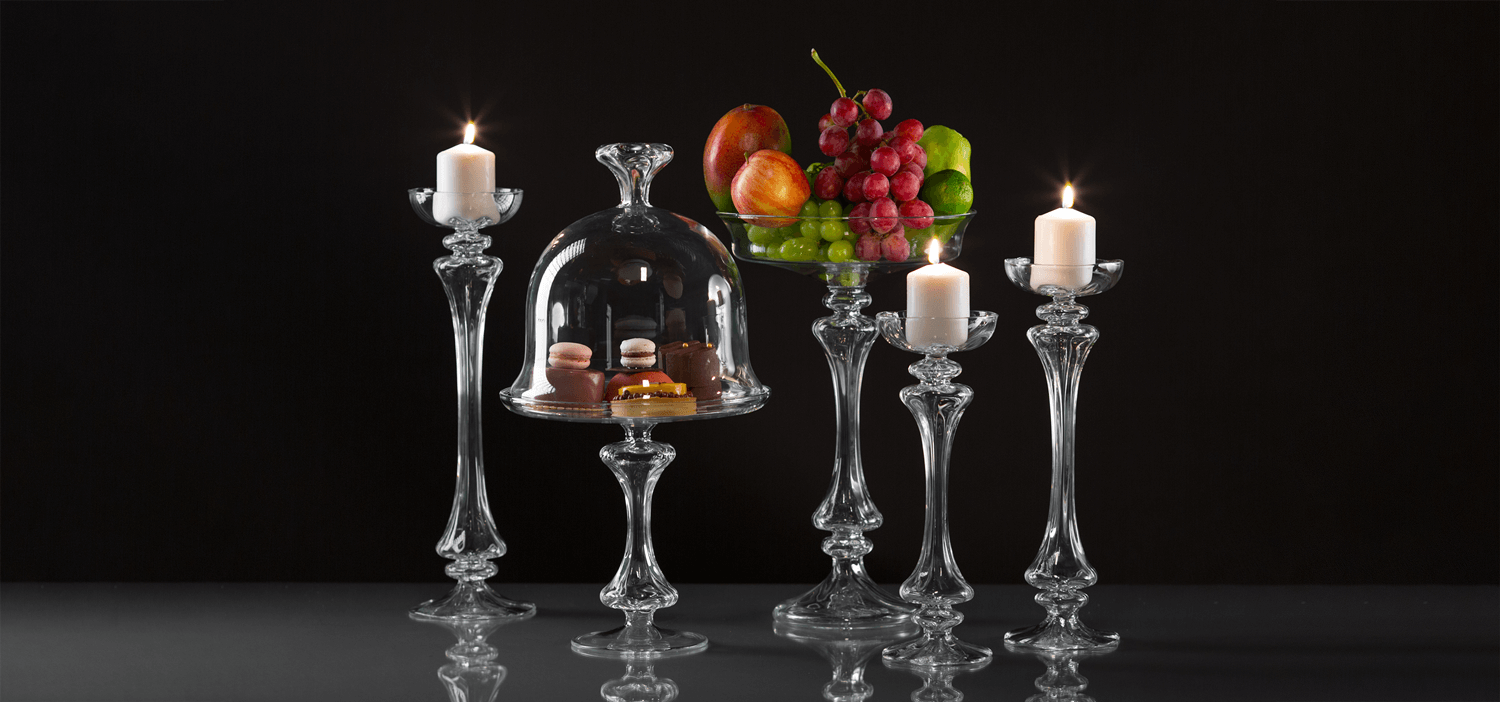 Dining Pieces Collection by Gabriela Seres – hand-blown borosilicate glass plates, bowls, and stands crafted in Bucharest.